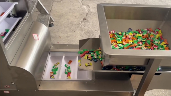 Ligne de conditionnement et de pesage automatiques de bonbons gélatines